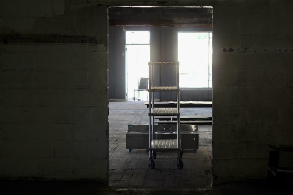 Ladder and construction materials in the future black box theater at 280 Blake Street