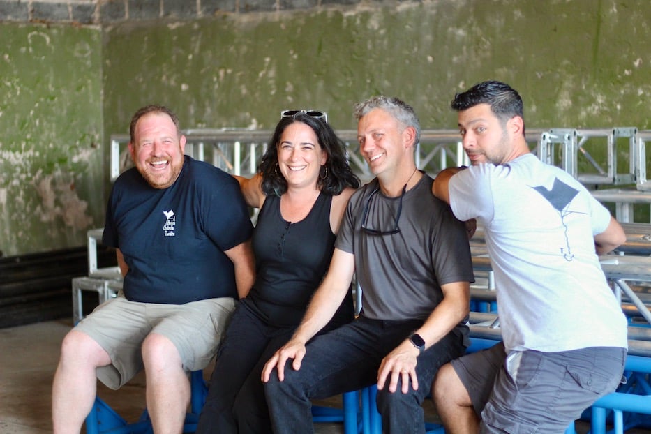 A Broken Umbrella Theatre leaders sitting inside the future Umbrella space at 280 Blake Street